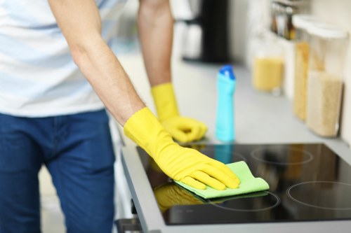 Close-up of a stained mattress being treated for cleaning